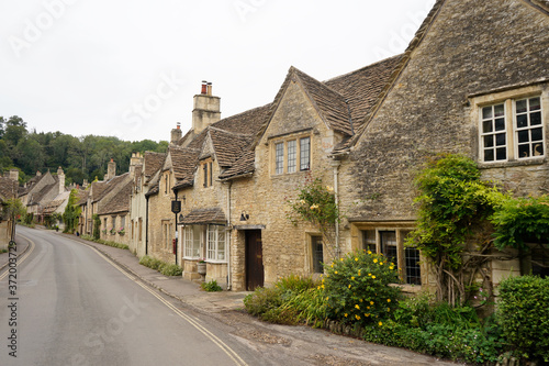 Castle Combe, England - 16/08/2020 - A row of old traditional stone houses in the English village 