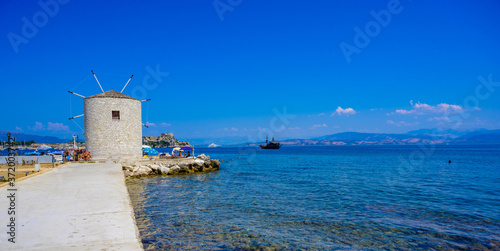 Traditional old stone Greek Windmill of island Corfu close to Kerkyra, Greece - travel destination in Europe