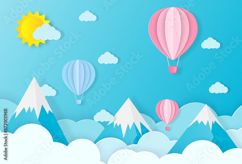 Ballon and Cloud in blue sky and mountains with paper art designs, vector design elements and illustrations photo