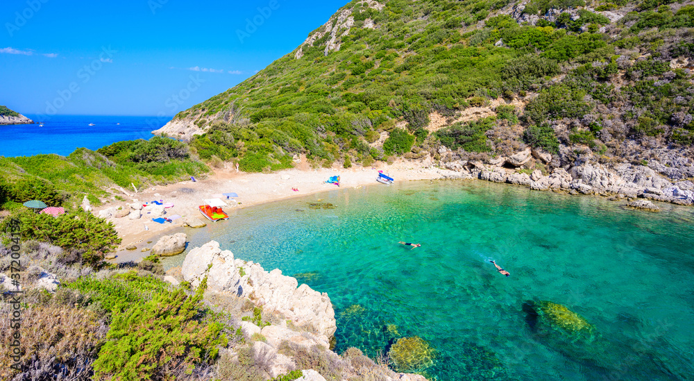 Porto Timoni beach at Afionas - -paradise and white double beach with crystal clear azure water in Corfu, Twin bay, Ionian island, Greece - Europe