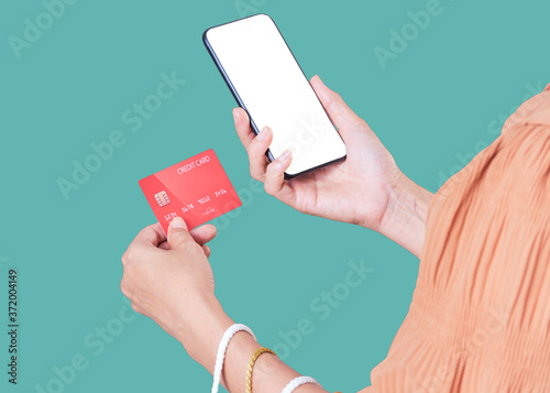Women using smartphones to pay