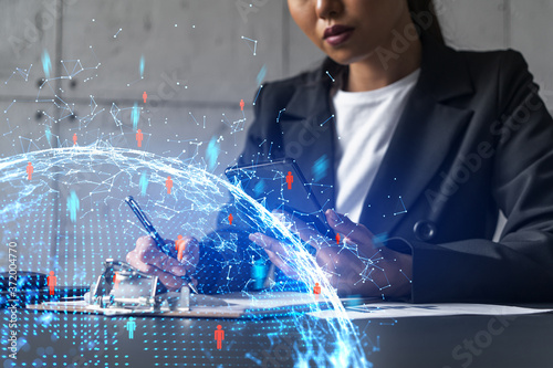 Businesswoman taking notes and social media icons hologram. Double exposure. Technology security network solution concept.