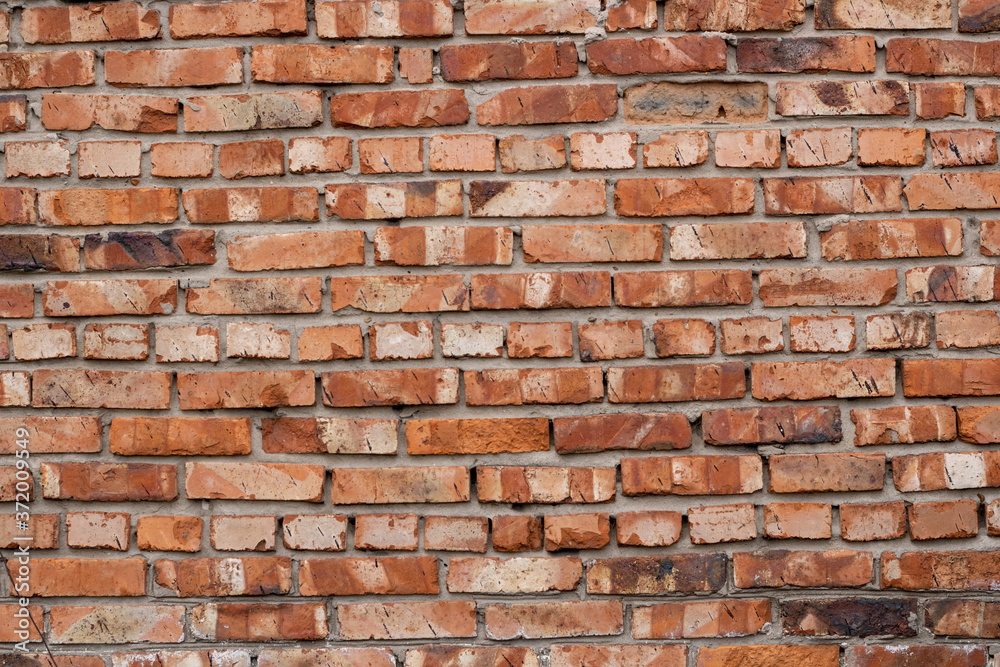 Wall of red bricks. Texture or background of bricks. Wall of red bricks. Texture or background of bricks.