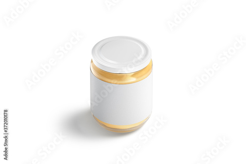 Blank glass jar with white label and peanut butter mockup photo