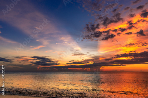 Morning sunrise and waves at the beach