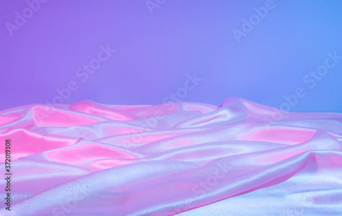 Iridescent neon background. Holographic Abstract soft pastel colors backdrop. Hologram Foil  Aesthetic. Trendy vaporwave creative gradient. photo