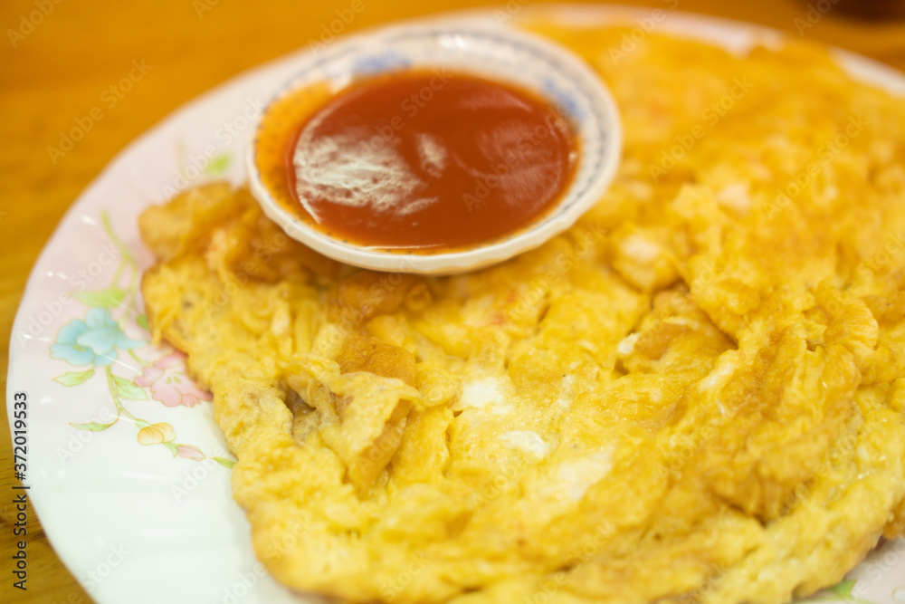 Crispy fried white crab meat omelette served with hot chili sauce