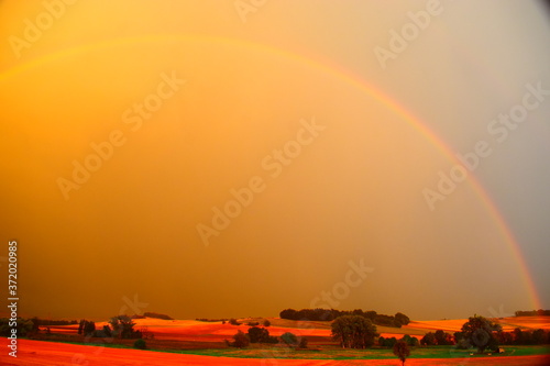 Regenbogen während eines Sommergewitters, Eifel photo