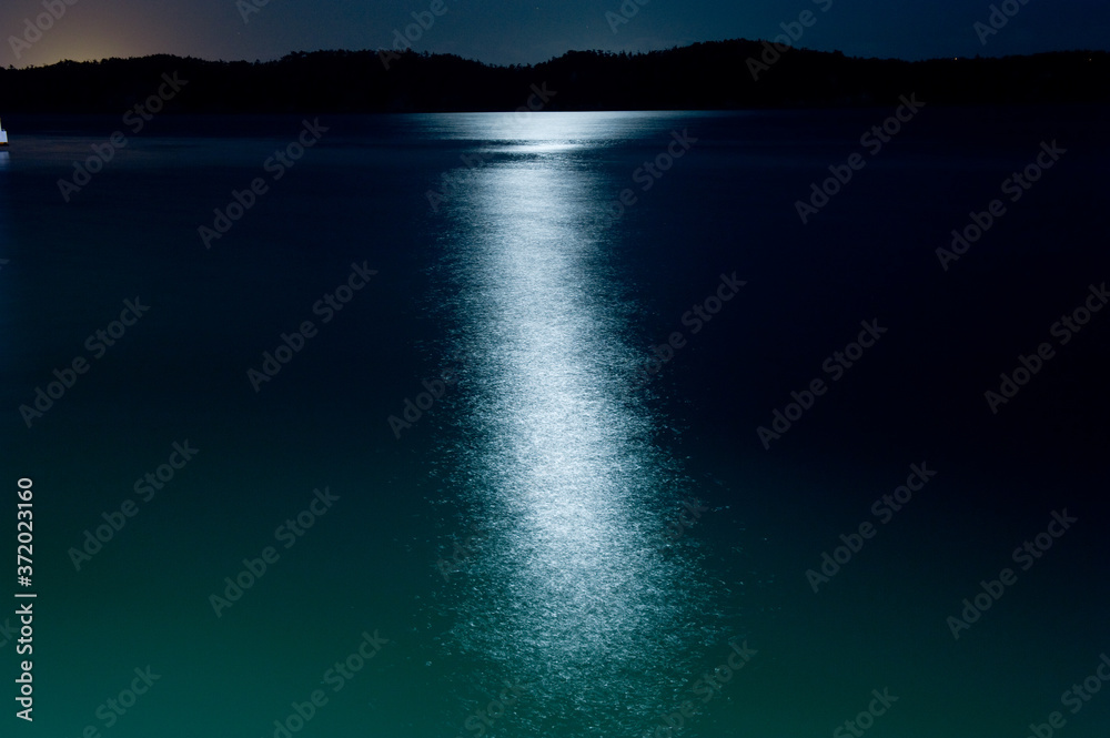 Fototapeta premium Wonderful night view of the sea,moon light reflection.