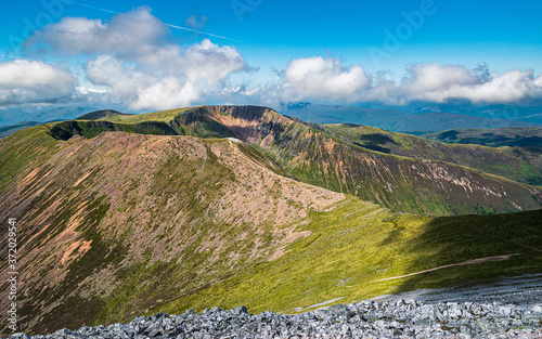 Beautiful Scottish HIghlands landscape. View towards Mullach nan Coirean of the Mamores ridge in Scottish HIghlands on a sunny summer day.