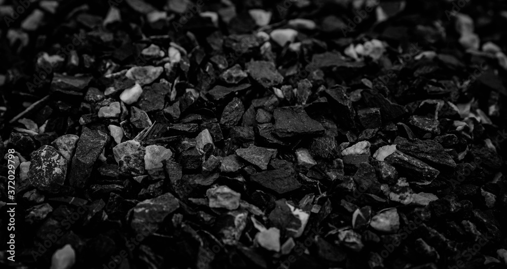 Coal Mine. Natural black coals for background. Industrial coals. Volcanic rock energy on earth. Stone Natural Energy Source.