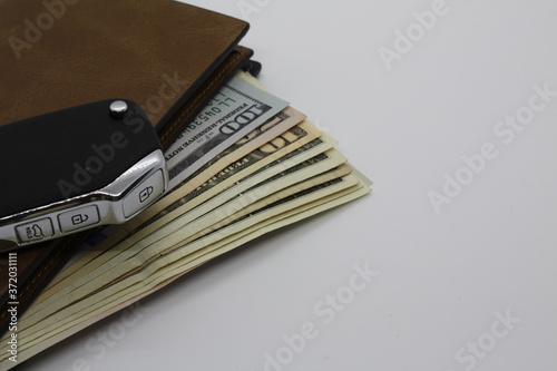car key, wallet with money