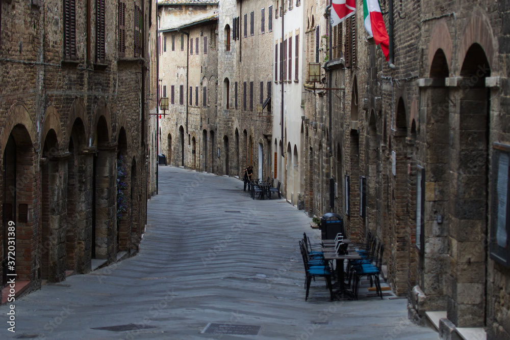 Alley of the city of San Gimignano in the morning