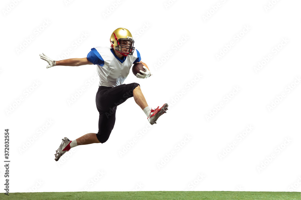 In jump, flight. American football player isolated on white studio background with copyspace. Professional sportsman during game playing in action and motion. Concept of sport, movement, achievements. In jump, flight. American football player isolated on white studio background with copyspace. Professional sportsman during game playing in action and motion. Concept of sport, movement, achievements.
