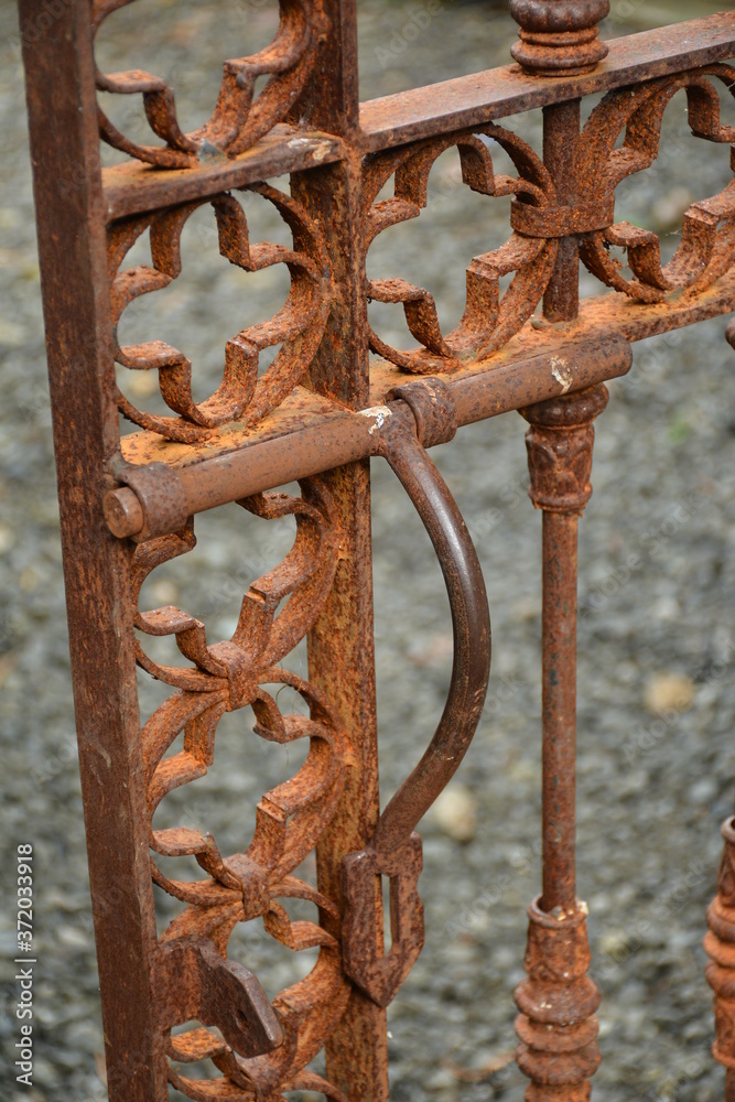 Rusted not painted iron metal garden gate Rusted not painted iron metal garden gate