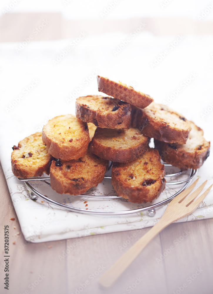 Garlic bread is on the table.
Garlic bread is on the table.