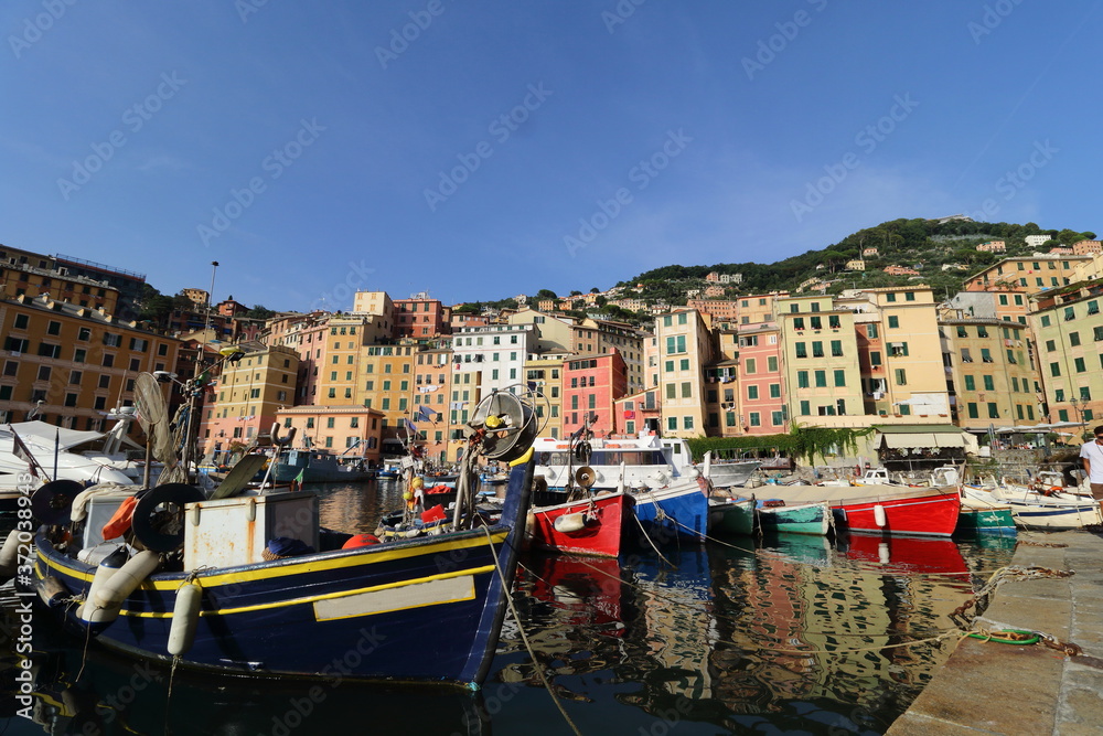 The characteristic seaside village of Camogli in the eastern Ligurian Riviera located between Recco and Rapallo. The heart of the town is in its characteristic porticcilo full of fishing boats and ple