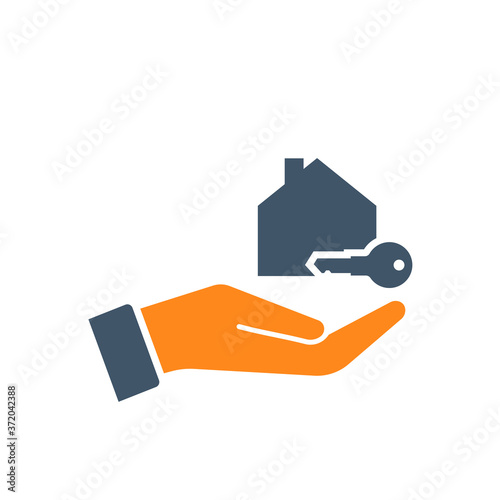 Hand holding house and key. Real Estate Vector Template. Hand Holding House Symbol. Buying a new house. Real estate agent giving a home keys to a buyer