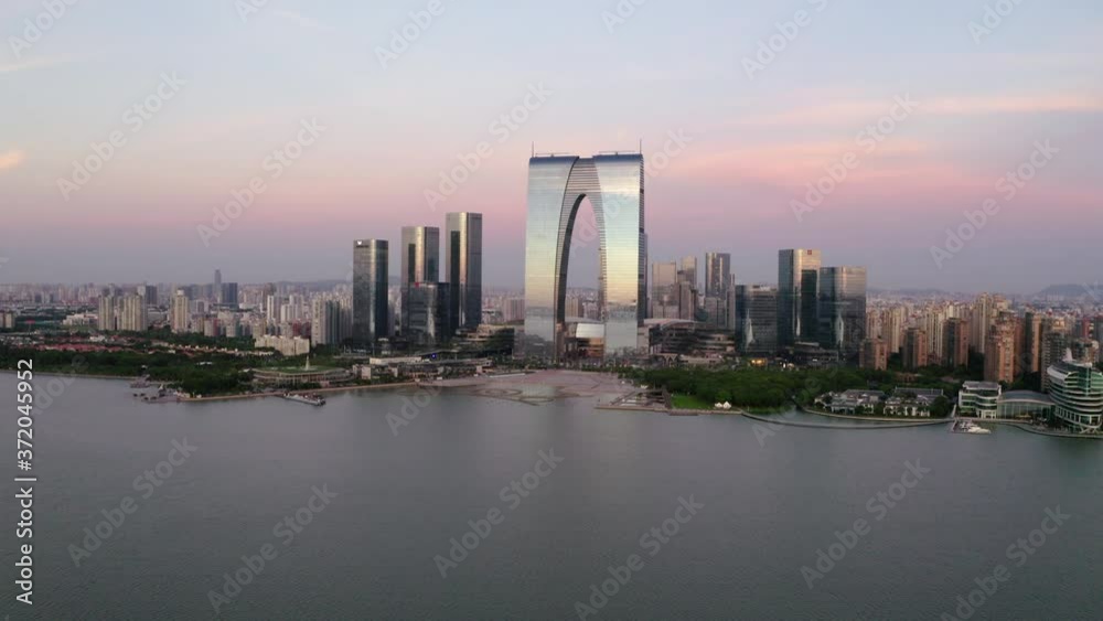 CBD buildings by the lake. Aerial in Suzhou, China. CBD buildings by the lake. Aerial in Suzhou, China.
