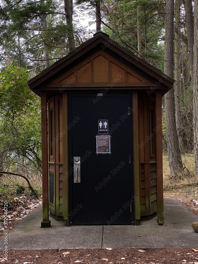 Outdoor restroom facilities in the woods Outdoor restroom facilities in the woods