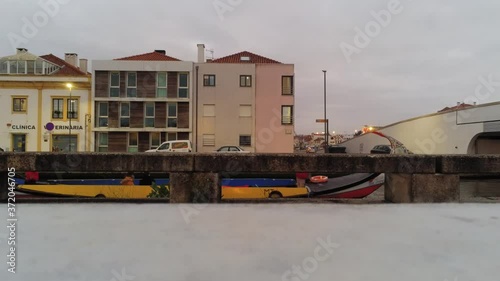 Moliceiro boat in Aveiro, historical village of Portugal. Aerial Drone Footage