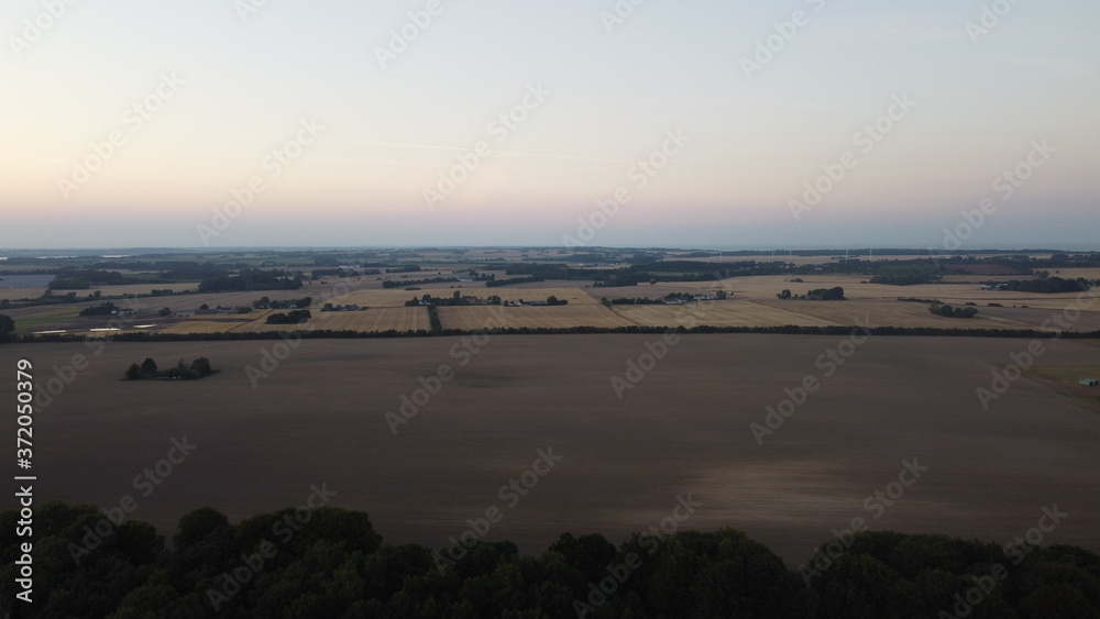 Sunset Aerial View Over Field