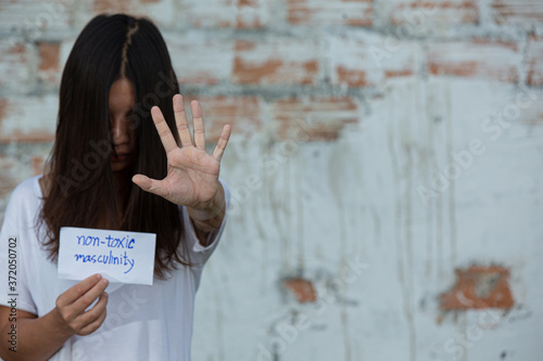 Women raising resistance signs International day of non violence. photo