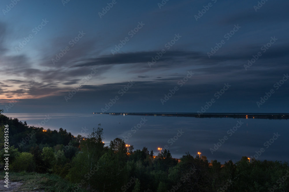 Evening landscape near the coast of the Kyiv sea, Ukraine. Evening landscape within the city limits.