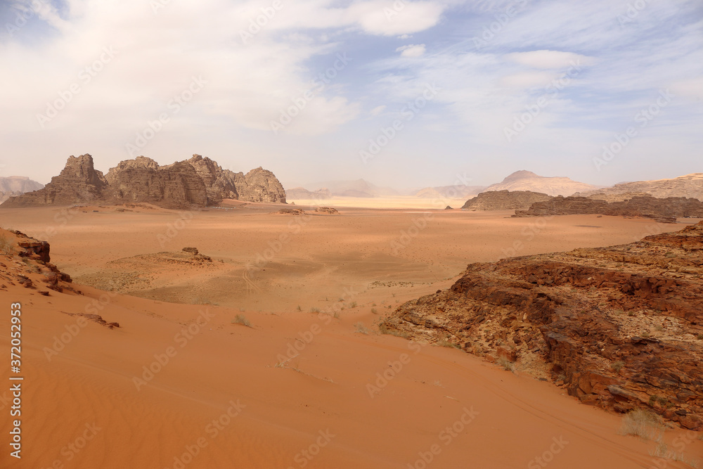 Wadi Rum.Reserve of the desert. Martian landscape. Fancy desert mountains against the sky.