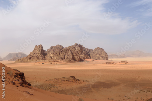 Wadi Rum.Reserve of the desert. Martian landscape. Fancy desert mountains against the sky.