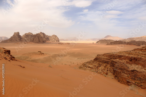 Wadi Rum.Reserve of the desert. Martian landscape. Fancy desert mountains against the sky.
