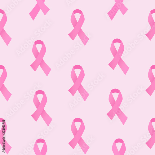 Breast cancer awareness ribbons seamless pattern. Pink ribbon tile background.