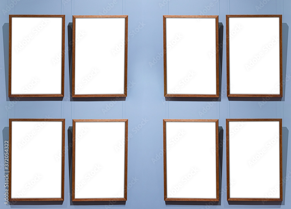Eight gallery mock up frame in interior blue wall on the left side Eight gallery mock up frame in interior blue wall on the left side