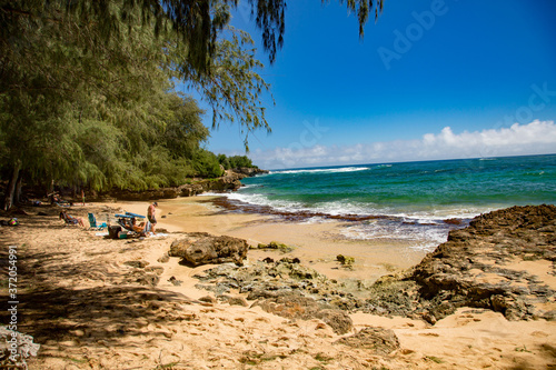 Fototapeta Naklejka Na Ścianę i Meble -  A small secluded, hidden beach on south shore of Kauai, Hawaii.
