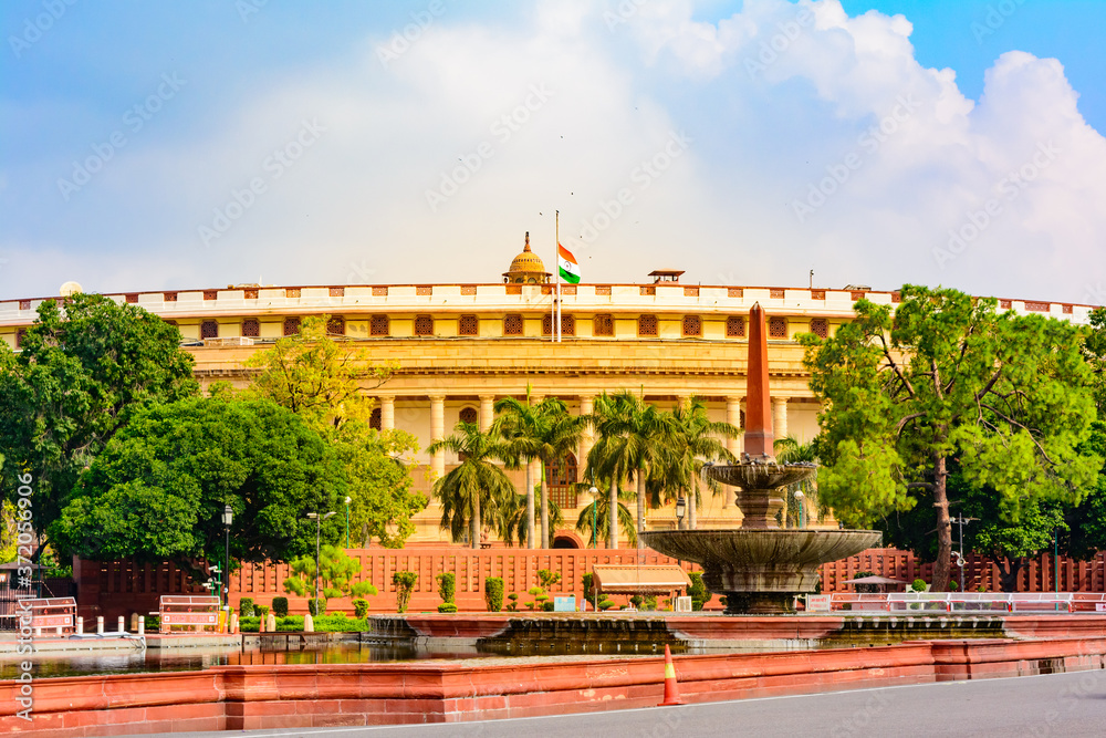 Fototapeta premium The Sansad Bhawan or Parliament Building is the house of the Parliament of India, New Delhi. It was designed based on Ashoka Chakra by the British architect Edwin Lutyens & Herbert Baker in 1912-13.