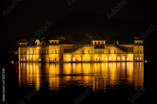 Illuminated night view of Jal Mahal 'Water Palace' is an architectural showcase of Rajput style in the Man Sagar lake in jaipur city, the capital of Rajasthan, India.