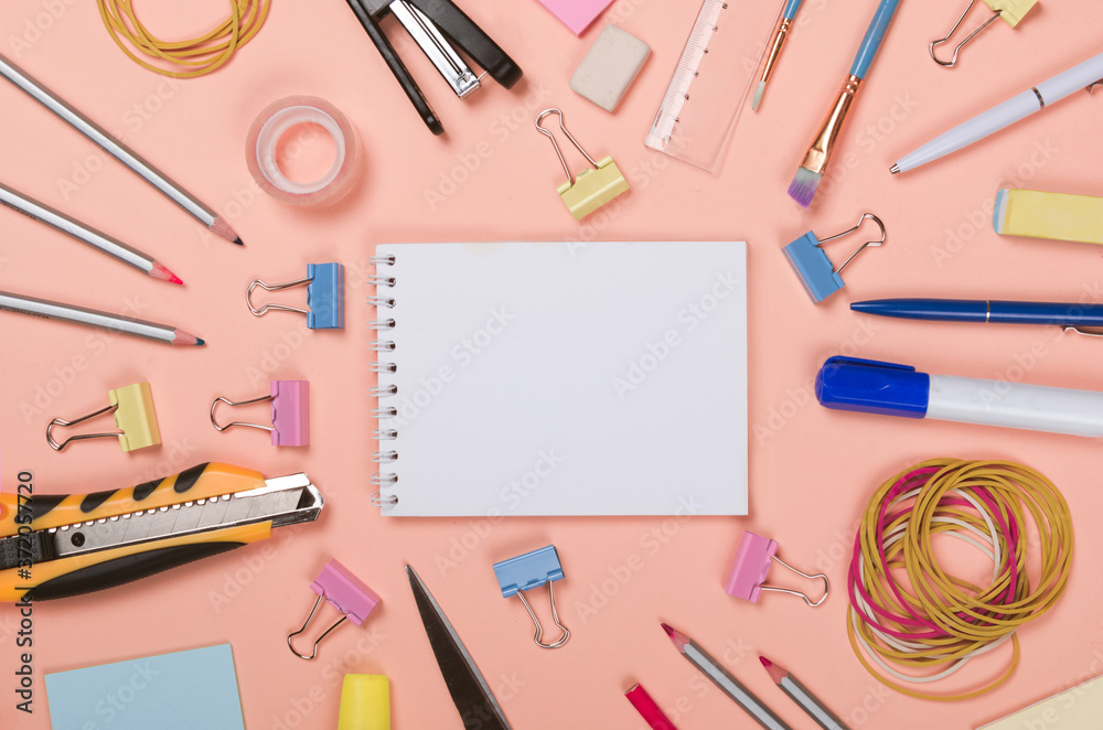 School supplies on light background School supplies on light background