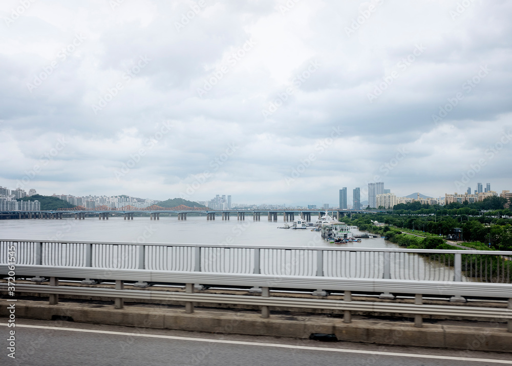 Naklejka premium August 08th 2020, passing by river in South Korea in a cloudy day. 