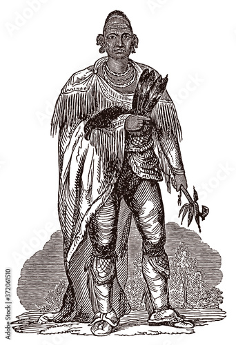 Black Hawk, historic Sauk chief in full body view, holding a tomahawk. Illustration after an antique engraving