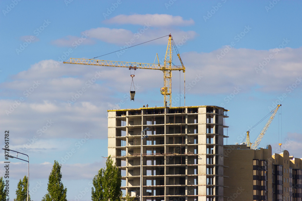 Construction crane and top of a building under construction