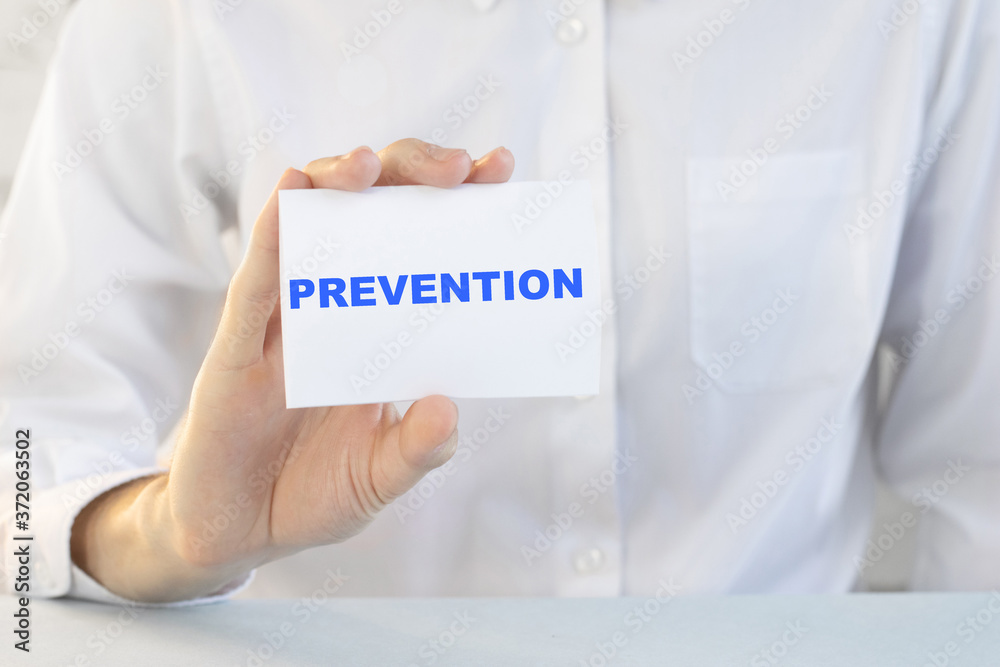 Doctor writing word Prevention with marker, Medical concept Doctor writing word Prevention with marker, Medical concept