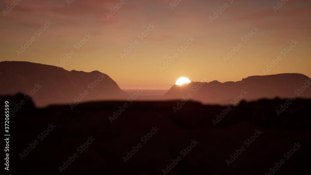AERIAL View of a beautiful sunset over scenic mountain valley. Golden hour. 4K UHD AERIAL View of a beautiful sunset over scenic mountain valley. Golden hour. 4K UHD