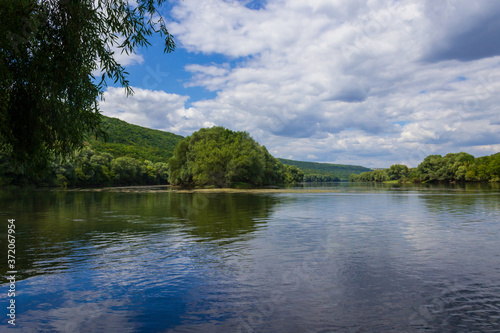 Very beautiful river water surface. Natural green background. photo