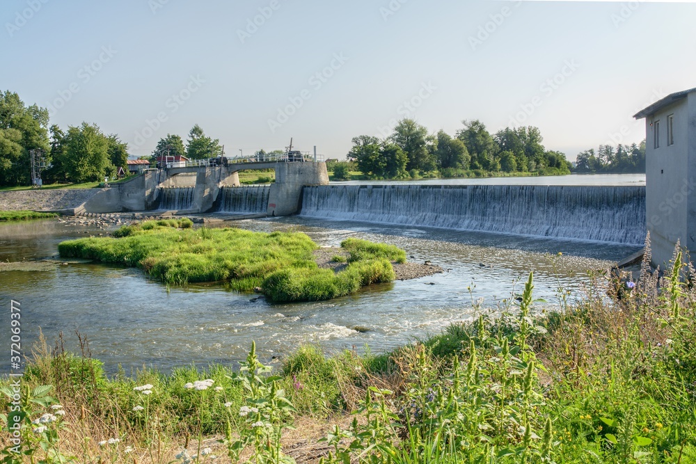 Weir on the Becva River near Osek. Central Moravia. Czechia. Europe. Weir on the Becva River near Osek. Central Moravia. Czechia. Europe.