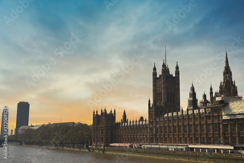 The Palace of Westminster along the banks of the Thames in central London, UK.