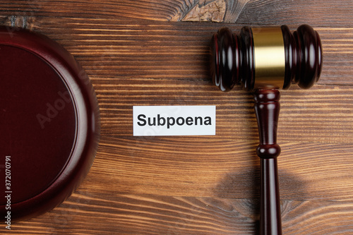 The concept of subpoena in court cases. photo