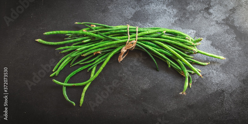 green beans raw legumes helthy eating natural product portion serving size, top viewt copy space for tex keto or paleo diet