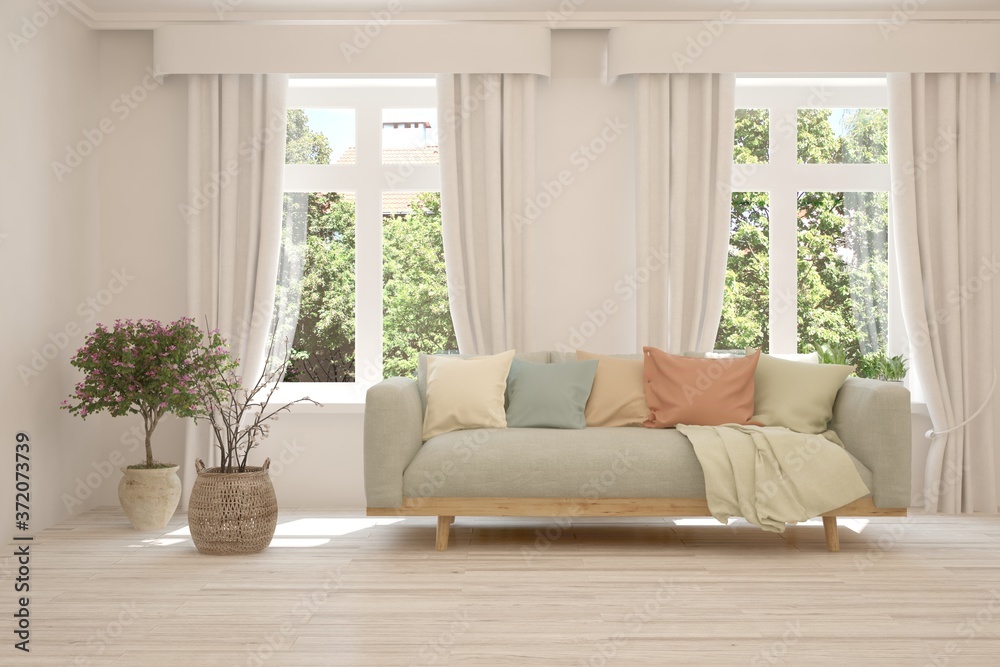 Fototapeta premium White living room with sofa and summer landscape in window. Scandinavian interior design. 3D illustration