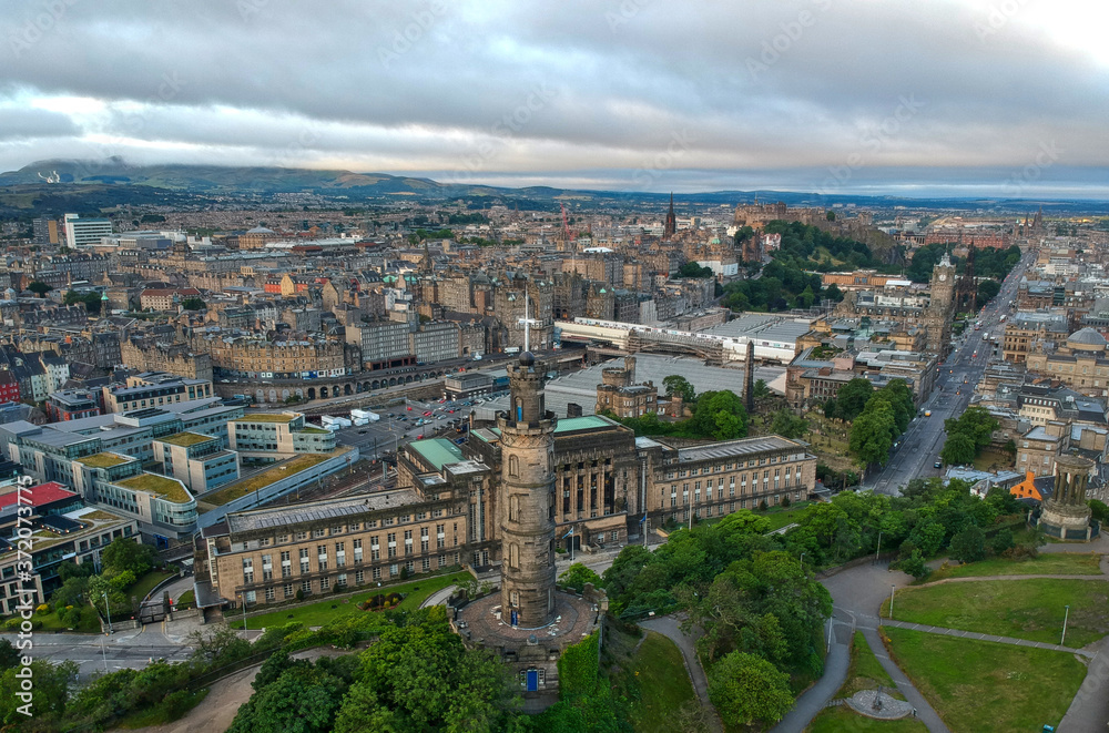 Aerial view of Calton Hill famous landmarks and Edinburgh old town Skyline in Scotland Aerial view of Calton Hill famous landmarks and Edinburgh old town Skyline in Scotland