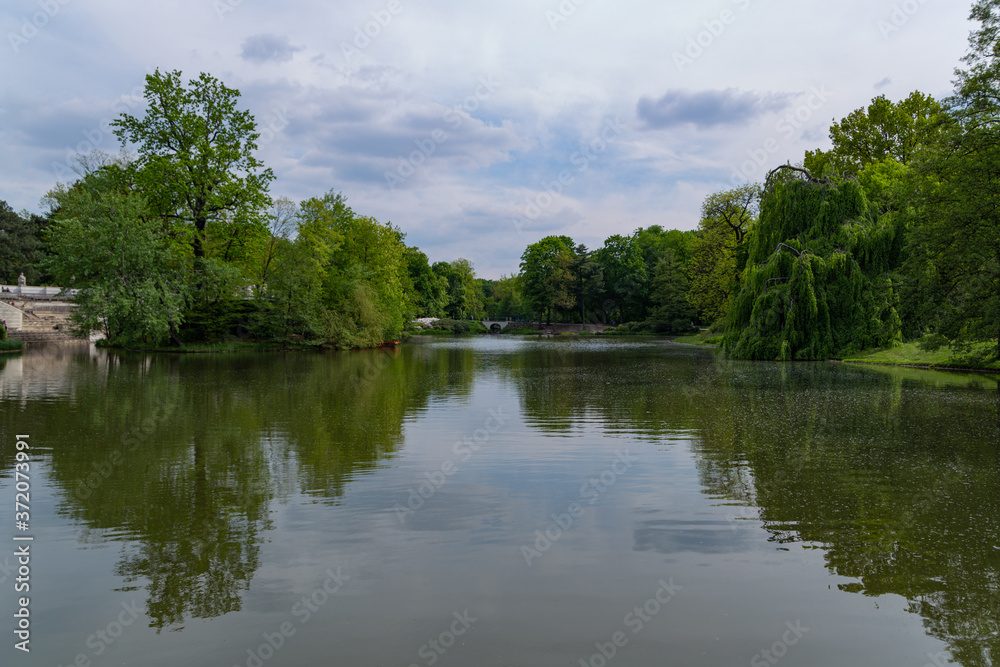 lake in Royal Baths Park is the largest park in Warsaw, Poland lake in Royal Baths Park is the largest park in Warsaw, Poland